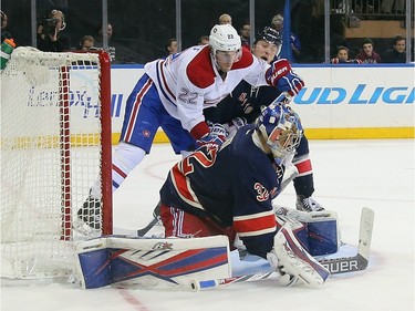 Antti Raanta #32 of the New York Rangers makes the third period save against the Montreal Canadiens at Madison Square Garden on November 25, 2015 in New York City. The Canadiens defeated the Rangers 5-1.