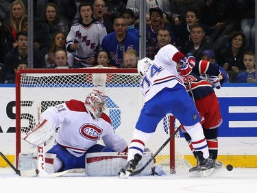 Canadiens' Carey Price makes a first-period save against the New York Rangers at Madison Square Garden on November 25, 2015 in New York City.