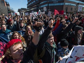 File photo: Students take part in a march against austerity outside UQAM university during a one-day strike organized by student group ASSÉ in Montreal on Thursday, April 3, 2014.