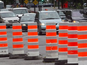 File photo: Traffic cones snarl traffic travelling west on Queen Mary near Côte-des-Neiges on  July 21, 2010.