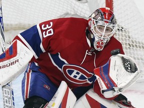 Canadiens rookie Mike Condon, stopping an Islanders shot in Montreal on Nov. 5, 2015, has a 5-0-1 record and leads the NHL with a 1.50 goals-against average.