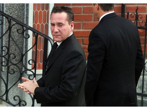 Leonardo Rizzuto, grandson of Nicolo Rizzuto Sr., arrives at the funeral of his grandfather and reputed former head of the Montreal Mafia at the Notre-Dame-de-la-Défense church in Little Italy in Montreal Nov. 15, 2010.