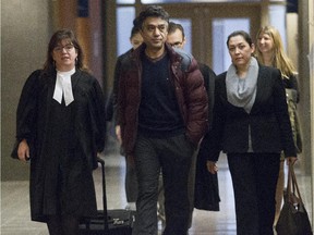 Dorval woman Johra Kaleki (right) leaves court for a break with her lawyer Isabel Schurman (left) and her husband Ebrahim Ebrahimi at the Montreal courthouse in Montreal on Monday, Nov. 2 , 2015. Kaleki was in court for her sentencing hearing. In March she was found guilty of attempted murder after attacking her daughter, Bahar Ebrahimi, with a meat cleaver in 2010.