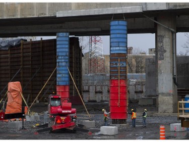 Forms are put in place for pouring of cement for columns at the Turcot construction site in Montreal.