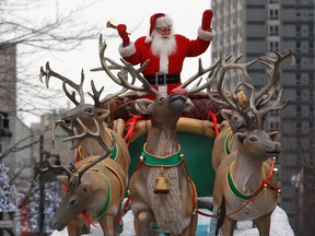 Santa Claus, atop a float on Ste-Catherine St. in Montreal in 2014.