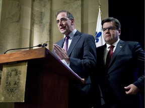 Executive Committee member Réal Ménard and Mayor Denis Coderre presented the city's Global Warming Adaptation Plan for 2015-2020 on Monday.