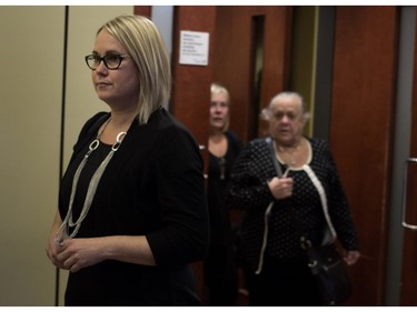 Isabelle Gaston, left, leaves the courtroom in St. Jerome, north of Montreal, on Wednesday November 25, 2015. Gaston was attending the trial of her former husband, Guy Turcotte, who killed their two children. (Allen McInnis / MONTREAL GAZETTE)