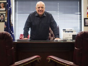Michel Trudel, president of MELS, has flags of the United States and the seal of the president of the U.S. on both sides of his desk in his office. They were once used as film props.