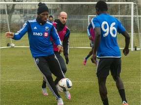 Impact star Didier Drogba gets set to kick ball during practice in Montreal on Nov. 6, 2015 in preparation for MLS playoff game against the Columbus Crew.