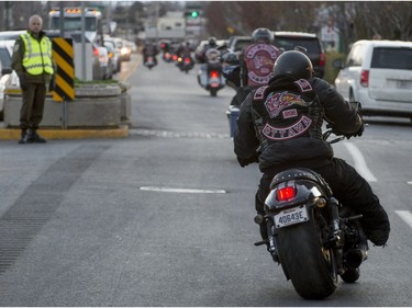 Motorcyclists leave the Alfred Dallaire Funeral Home in Repentigny on Saturday, November 7, 2015. as hundreds of members of several motorcycle clubs from across Canada gather for the funeral of 63-year-old Lionel Deschamps, a member of Hells Angels Montreal chapter.
