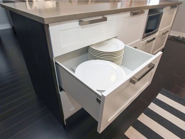 Dishes are stored in drawers instead of in the upper cabinets. (John Mahoney / MONTREAL GAZETTE)