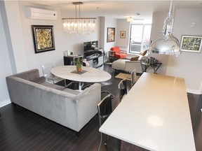 The kitchen island, right, the dining area and the living room. (John Mahoney / MONTREAL GAZETTE)