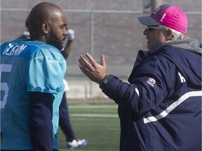 Alouettes head coach Jim Popp, right, speaks with quarterback Kevin Glenn, during Alouettes practice on Wednesday October 21, 2015.