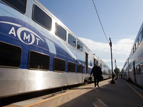 Commuters get on trains at the Lucien L'Allier station in Montreal: should trains be equipped with Wi-Fi?