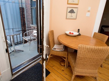A small balcony with table and chairs is just off the kitchen.  (Allen McInnis / MONTREAL GAZETTE)