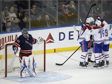 New York Rangers goalie Henrik Lundqvist stands in front of the net after the Montreal Canadiens scored a goal during the third period of an NHL hockey game, Wednesday, Nov. 25, 2015, in New York. The Canadiens won 5-1.