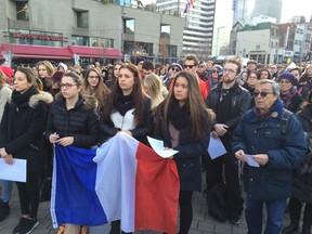 NOVEMBER 16, 2014 - Montrealers gather in front of the Place des Arts to show solidarity with Paris (Jason Magder/ MONTREAL GAZETTE)