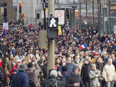 People participate in a march of solidarity in Montreal, on Sunday, Nov. 15, 2015, to show their support for  the victims of the Paris attacks.