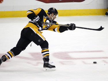 Pascal Dupuis breaks his stick on a slap shot during the first period against the Habs on Wednesday night.