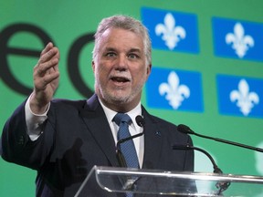 Quebec Premier Philippe Couillard addresses the opening session of the Quebec Union of Municipalities annual convention Thursday, May 21, 2015 in Montreal.
