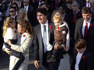Prime Minister-designate Justin Trudeau, his wife Sophie Grégoire-Trudeau and their children Ella-Grace, Hadrien and Xavier lead the new Liberal cabinet to Rideau Hall in Ottawa on Wednesday, Nov. 4, 2015.