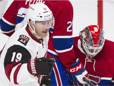 Arizona Coyotes' Shane Doan (19) celebrates a goal by teammate Oliver Ekman-Larsson, not shown, on Montreal Canadiens goaltender Mike Condon during second period period NHL hockey action in Montreal, Thursday, November 19, 2015.