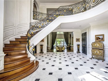 Elegant stairway is a bit of a show-stopper. (Photo courtesy of Royal LePage.)