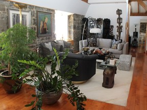 The living room in condo unit in heritage home in Old Montreal. Photo by Helga Loverseed, Special to the Montreal Gazette.