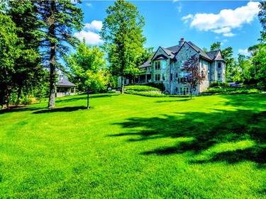 The mansion sits on seven acres of property fronting the lake. (Photo courtesy of Royal LePage.)