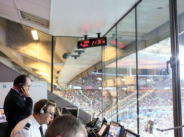 A handout picture taken and released on November 13, 2015 by the Presidence of the Republique shows French President Francois Hollande in the security control room at the Stade de France stadium in Saint-Denis, near Paris, on November 13, 2015, as he learns about several attacks in Paris. Over 100 were killed and others injured in a series of attacks across Paris on Friday, as well as explosions outside the national stadium where France was hosting Germany.