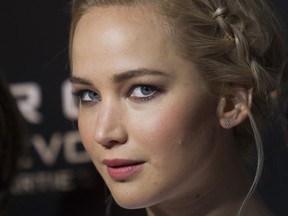 “It’s just a bizarre experience,” Jennifer Lawrence says of her first sex scene — with Chris Pratt in the movie Passengers.