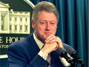 U.S. President Bill Clinton speaks to reporters July 5, 1996 at the White House about the U.S. economy.