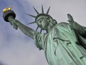 The Statue of Liberty in New York harbour: Watching the news over the past year there were many reasons to cringe at U.S. President Donald Trump's behaviour, but as 2018 dawns, I remain steadfastly thankful for his country, Matthew Hays writes.