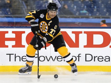 Ray Bourque #77 of the Boston Bruins skates against the Montreal Canadiens during the 2016 Bridgestone NHL Winter Classic  Alumni Game at Gillette Stadium on December 31, 2015 in Foxboro, Massachusetts.