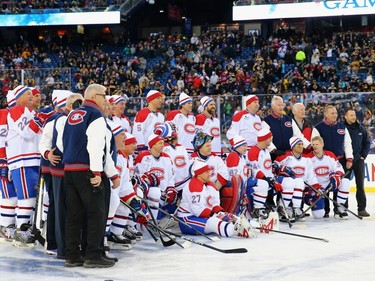 The Montreal Canadiens alumni team stands for a photo before the 2016 Bridgestone NHL Winter Classic Alumni Game against the Boston Bruins at Gillette Stadium on December 31, 2015 in Foxboro, Massachusetts.