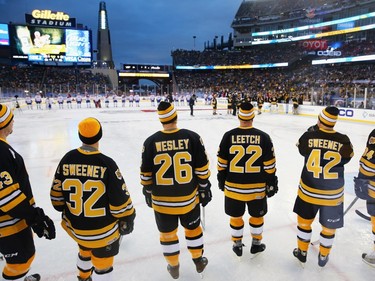 Don Sweeney #32, Glen Wesley #26, Brian Leetch #22, Tim Sweeney #42, and Bob Beers #34 of the Boston Bruins wait to be introduced before the 2016 Bridgestone NHL Winter Classic  Alumni Game against the Montreal Canadiens at Gillette Stadium on December 31, 2015 in Foxboro, Massachusetts.