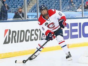 Carly Hill #6 of the Les Canadiennes (CWHL) skates against the Boston Pride (NWHL) during the Outdoor Womens Classic at Gillette Stadium on December 31, 2015 in Foxboro, Massachusetts.