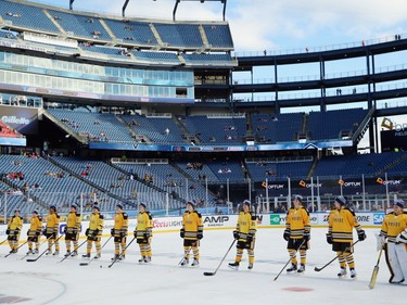 The Boston Pride (NWHL) prepare for their game against the Les Canadiennes (CWHL) during the Outdoor Womens Classic at Gillette Stadium on December 31, 2015 in Foxboro, Massachusetts.