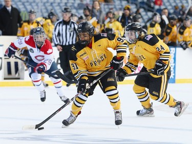 Rachel Llanes #91 of the Boston Pride (NWHL) skates against the Les Canadiennes (CWHL) during the Outdoor Womens Classic at Gillette Stadium on December 31, 2015 in Foxboro, Massachusetts.