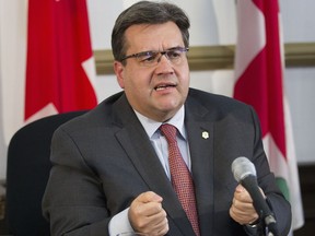 Mayor Denis Coderre, shown here in a Nov. 25 photo, says the city of Montreal will be sending a bill to the blue collar workers' union.