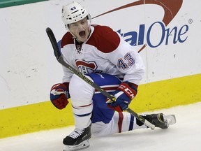 Canadiens' Daniel Carr celebrates scoring a goal during the second period of an NHL hockey game against the Stars on Saturday, Dec. 19, 2015, in Dallas.