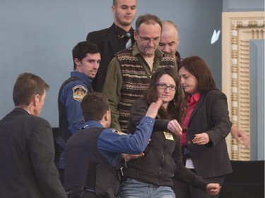 Demonstrators against Bill 70, an act to amend the Mining Act, throw paper planes during question period, Tuesday, December 1, 2015 at the legislature in Quebec City.