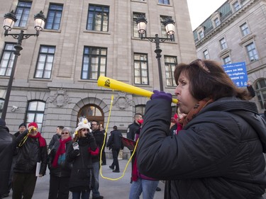 Demonstrators of the public sector block the entrance of a special cabinet meeting, Monday, October 5, 2015 at the legislature in Quebec City.