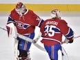 Montreal Canadiens' goalie Dustin Tokarski (35) is replaced by Montreal Canadiens' goalie Mike Condon (39) after giving up the third goal during second period NHL hockey action against the San Jose Sharks, in Montreal, on Tuesday, Dec. 15, 2015.