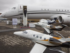 Miniature models of planes by Brazilian aerospace giant Embraer displayed in 2012.