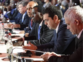 Greek Prime Minister Alexis Tsipras (2nd-R) and other delegates attend the inaugural session of the COP 21 United Nations conference on climate change, on November 30, 2015 at Le Bourget, on the outskirts of the French capital Paris. More than 150 world leaders are meeting under heightened security,  for the 21st Session of the Conference of the Parties to the United Nations Framework Convention on Climate Change (COP21/CMP11), also known as "Paris 2015" from November 30 to December 11.