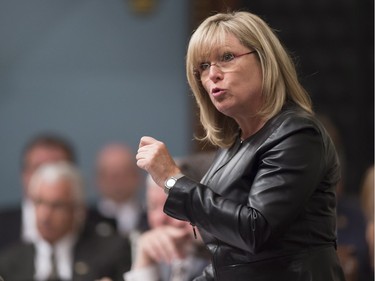 Quebec Families Minister Francine Charbonneau responds to Opposition questions, Wednesday, September 23, 2015 at the legislature in Quebec City.