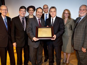From left, ex-PQ ministers Jean Campeau and Sylvain Simard in attendance with Renaud Lachance, centre right, in October 2011 at  an HEC event where Lachance was honoured as a "distinguished alumnus."
