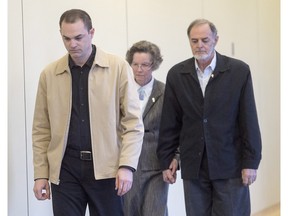 Guy Turcotte is followed into the courtroom by his father Réal Turcotte (L) and mother Marguerite Fournier  to hear a question from the jury as they deliberate for the third day, Wednesday, December 2, 2015 in Saint- Jerome, Que..