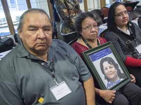Johnny Wylde and Emilie Ruperthouse-Wylde, parents of Sindy Ruperthouse, a missing Algonquin woman, sit in a meeting between native leaders and Quebec Premier Philippe Couillard Wednesday, November 4, 2015 in Montreal.